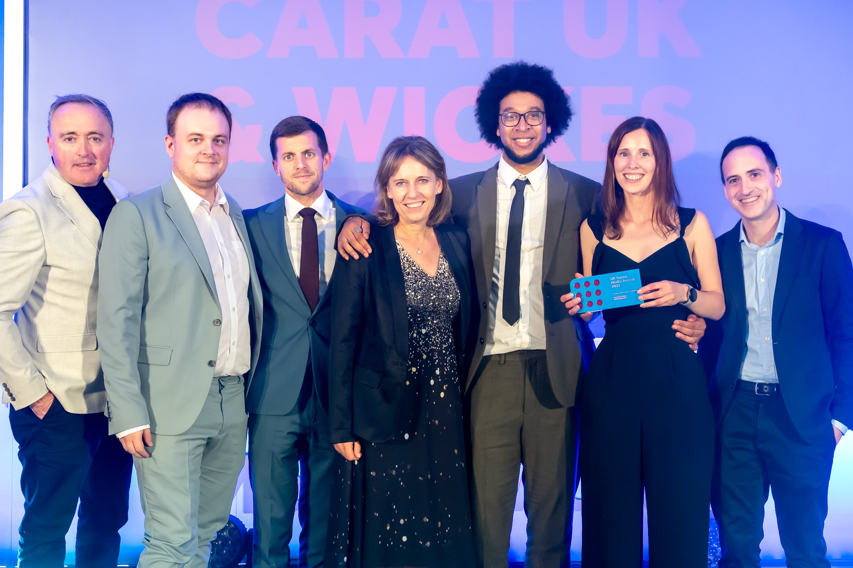 Carat team accepting UK Social Media Award for Wickes campaign