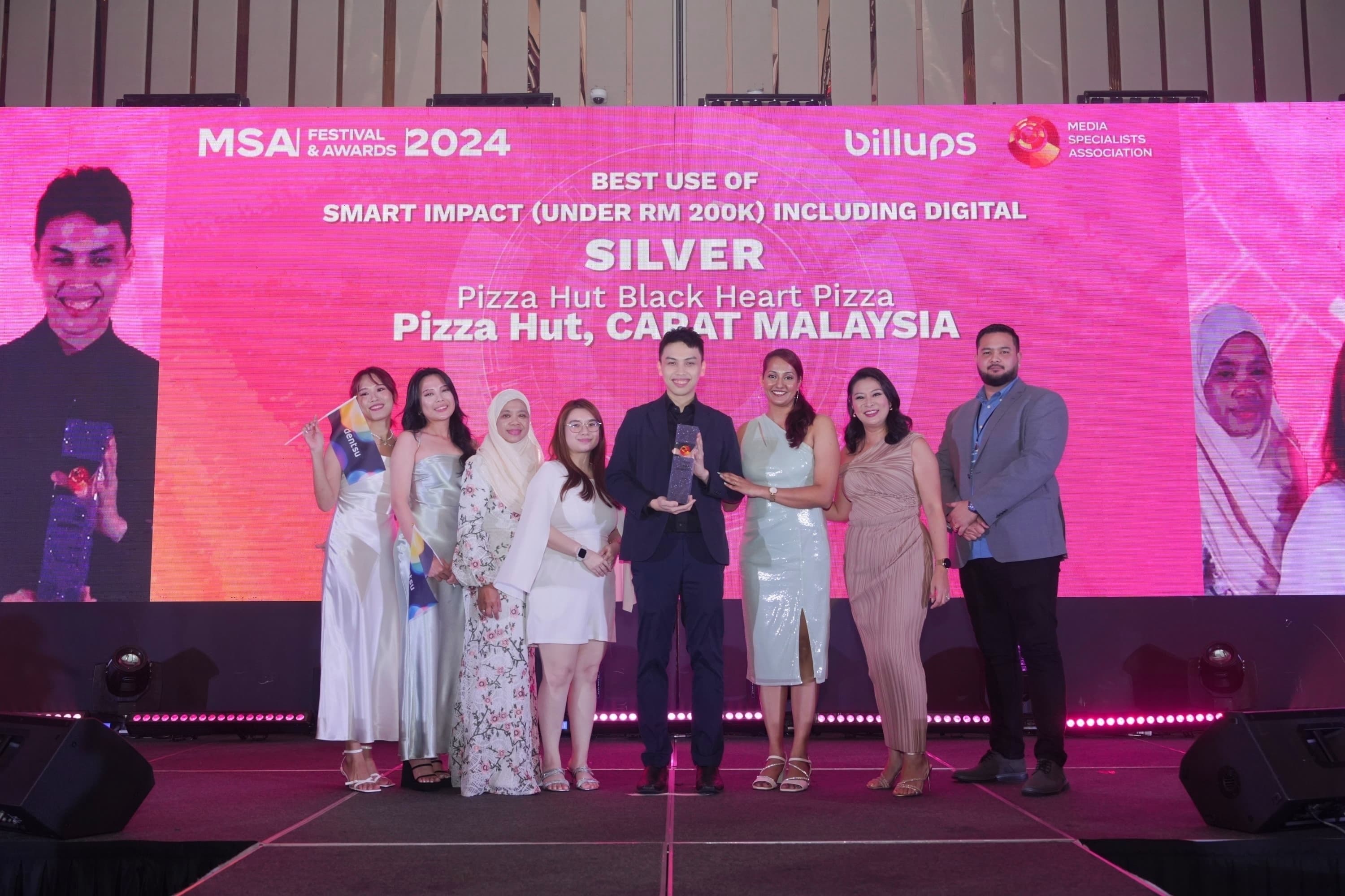 crew of people receiving awards