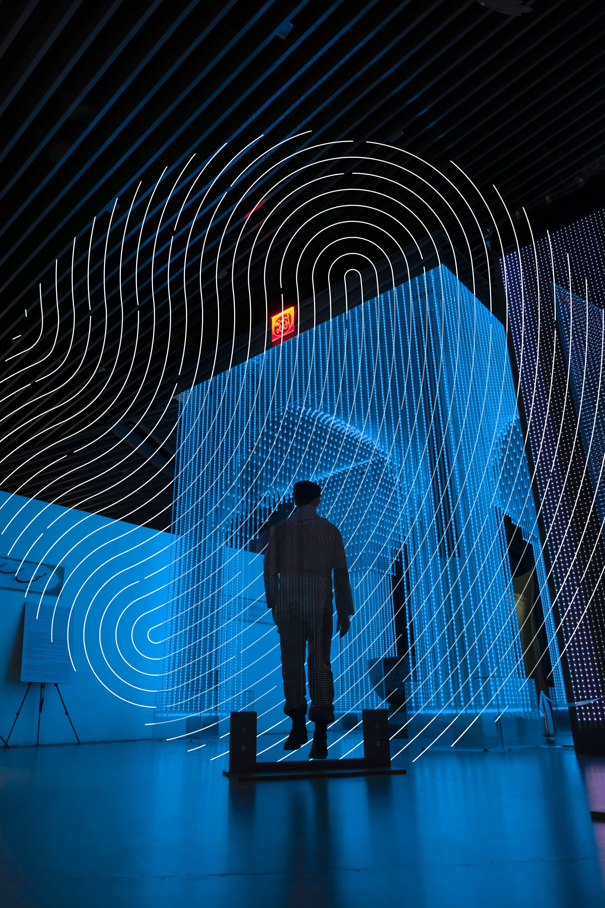 Image of a Man Walking into a Digital AI Blue Wall