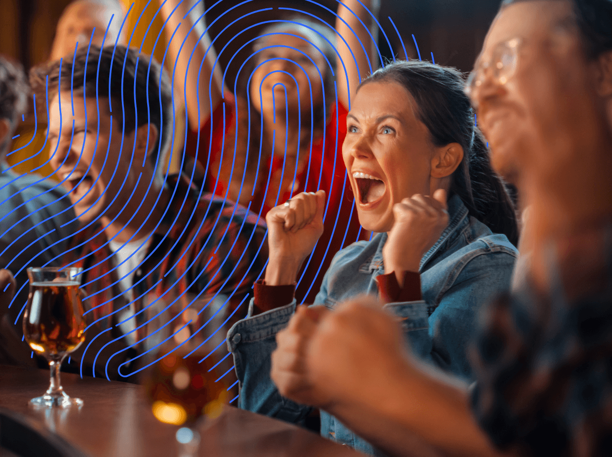People cheering in pub