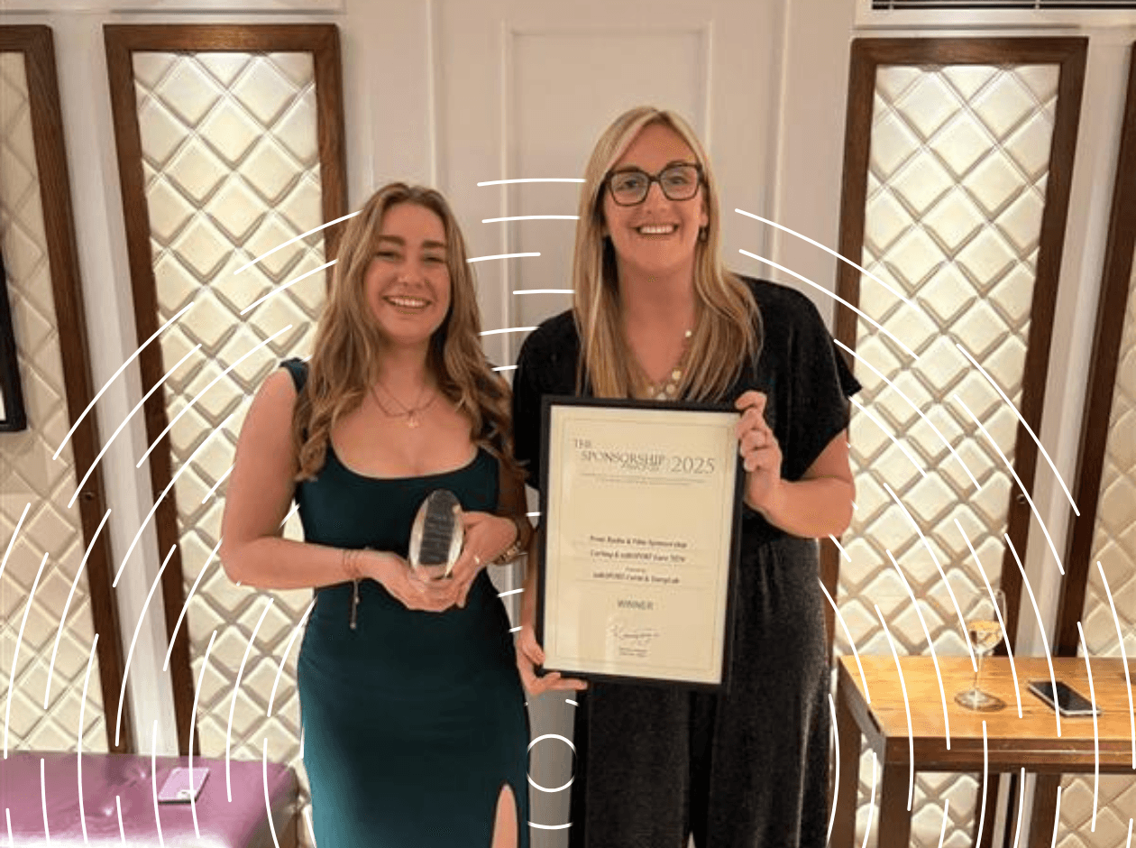 Carat team accepting UK Sponsorship Award for Carling campaign