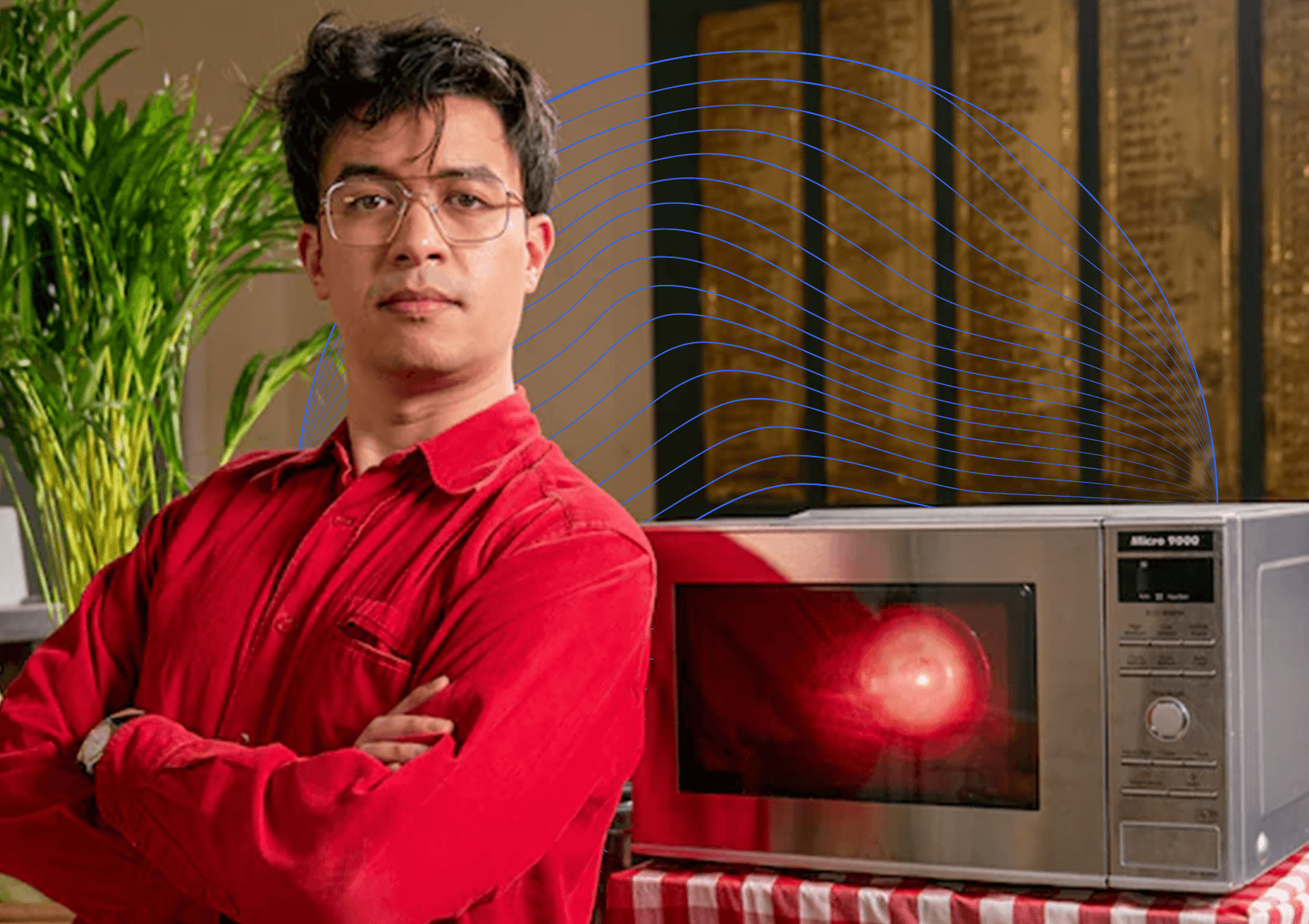 Man standing next to Microwave