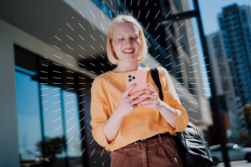 image of woman in yellow top smiling with carat branding 2025 vodafone