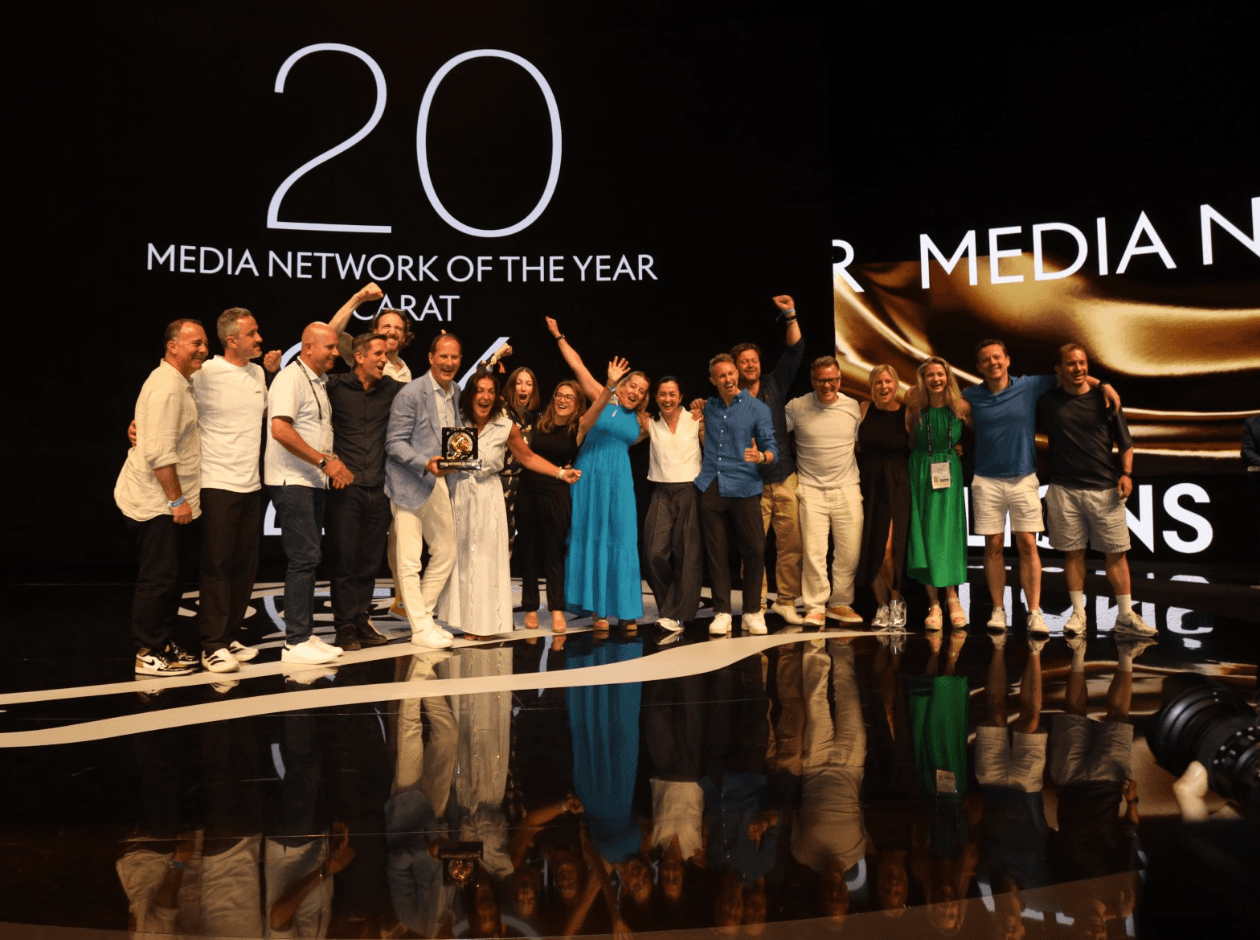 People on stage celebrating
