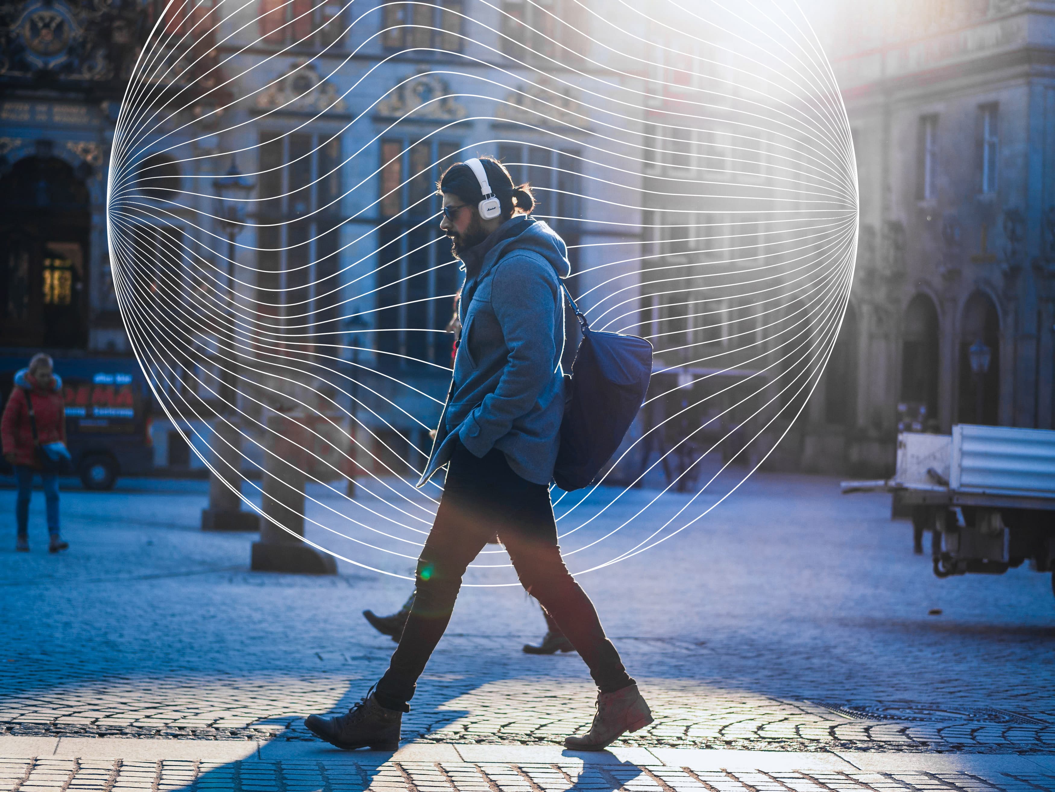 Guy Listening to Music on the Street
